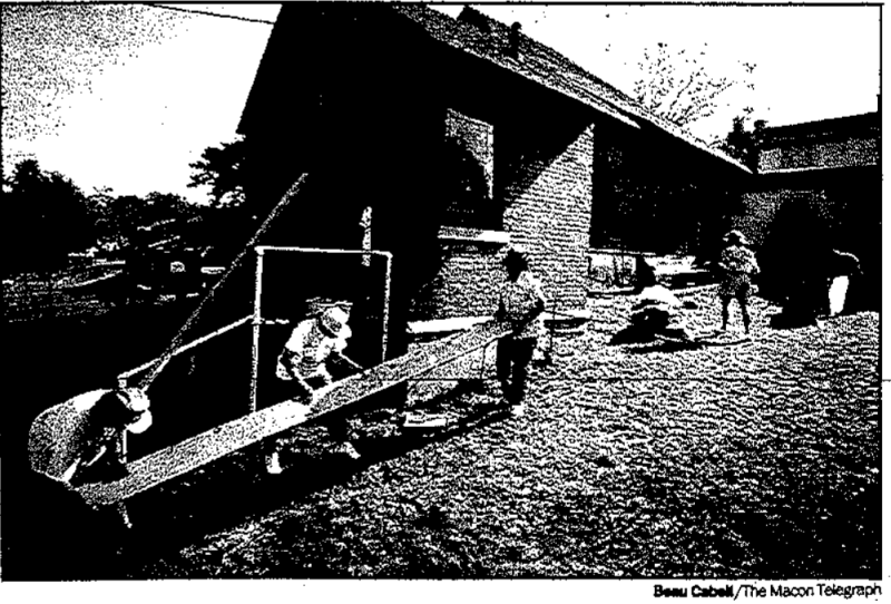 Volunteers working to improve the center in 1994.